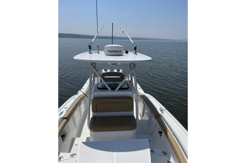  Yacht Photos Pics 2018 Buddy Davis 28 Center Console boat on calm water, featuring Garmin equipment.