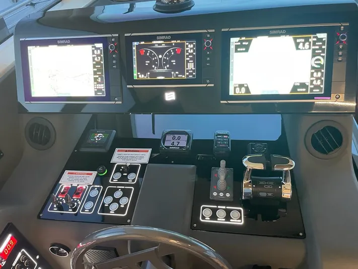  Yacht Photos Pics Ferretti Yachts 550 2016 model dashboard with navigation and control systems.