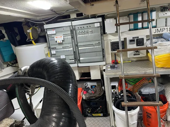  Yacht Photos Pics Engine room of a 2016 Ferretti Yachts 550 with equipment and storage.