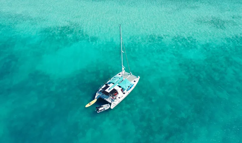 Majestic Yacht Photos Pics Aerial view of 1999 St Francis 44 MKII catamaran on turquoise water.