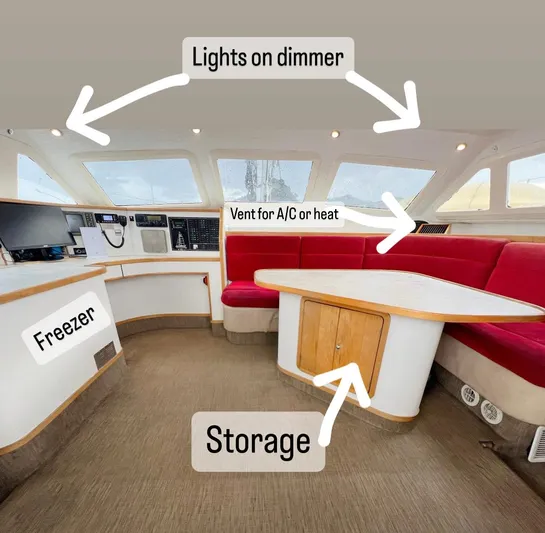Majestic Yacht Photos Pics Interior of 1999 St Francis 44 MKII yacht with seating, storage, and dimmable lights.
