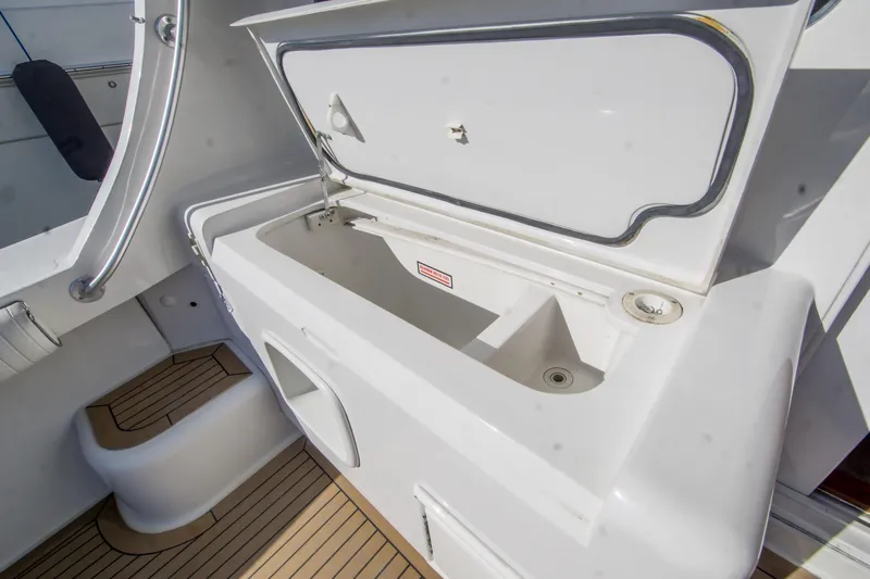 Lost Boys Yacht Photos Pics Open storage compartment on 2002 Luhrs 36 Convertible boat deck.