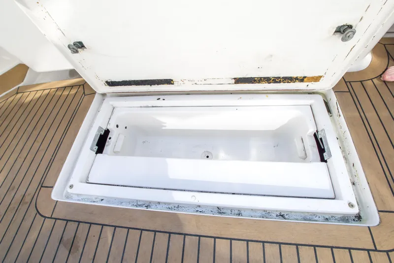 Lost Boys Yacht Photos Pics Open storage compartment on 2002 Luhrs 36 Convertible boat deck.