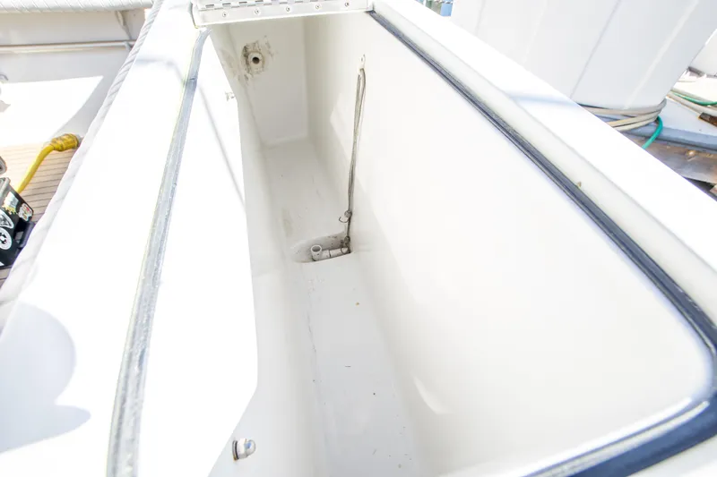 Lost Boys Yacht Photos Pics Open storage compartment on 2002 Luhrs 36 Convertible boat deck.