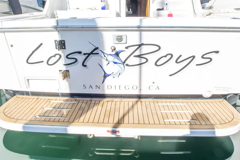 Lost Boys Yacht Photos Pics 2002 Luhrs 36 Convertible boat named "Lost Boys" docked in San Diego, CA.