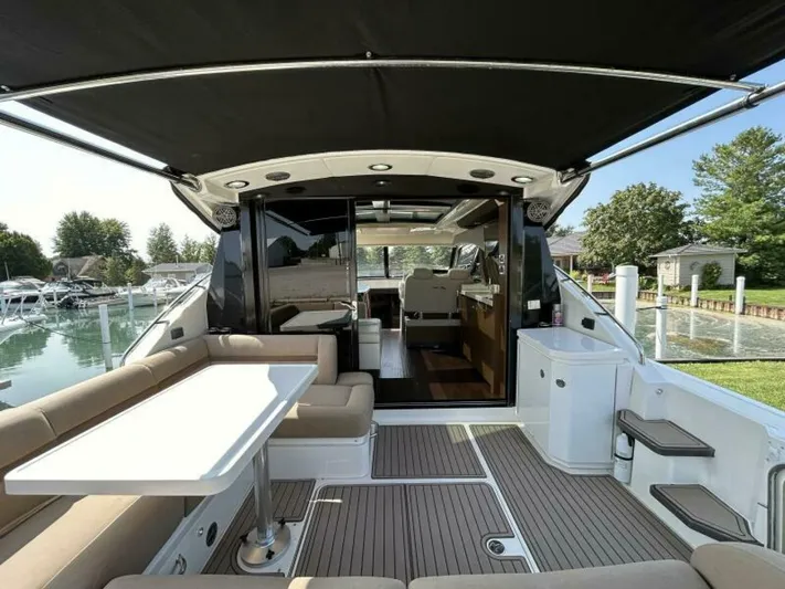  Yacht Photos Pics 2014 Sea Ray 510 Sundancer yacht with spacious outdoor seating and dining area.