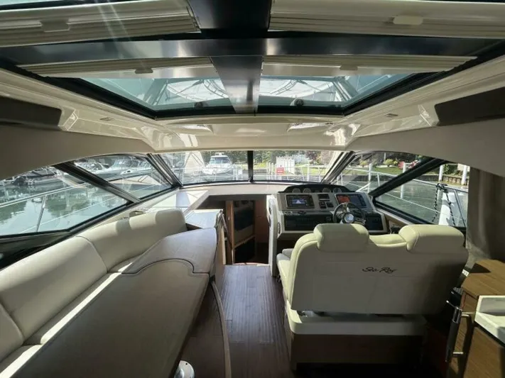  Yacht Photos Pics Interior of 2014 Sea Ray 510 Sundancer yacht with luxurious seating and panoramic windows.