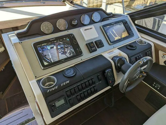  Yacht Photos Pics Helm of 2014 Sea Ray 510 Sundancer with advanced navigation and control systems.