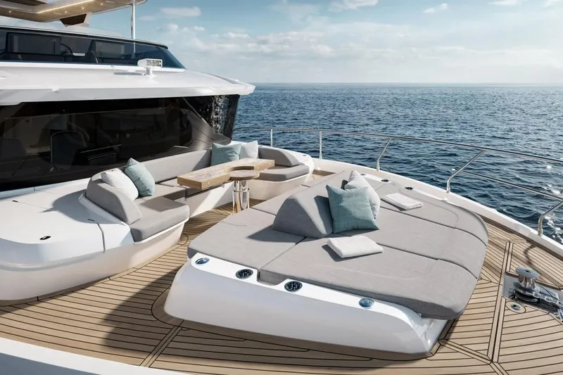 Yacht Photos Pics Luxurious 2026 Absolute Navetta 66 yacht deck with elegant seating and ocean view.
