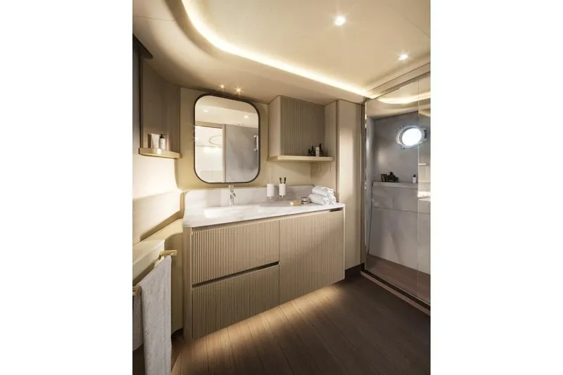  Yacht Photos Pics Luxurious bathroom interior of 2026 Absolute Navetta 66 yacht, featuring modern design and elegant fixtures.