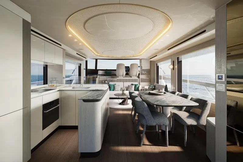  Yacht Photos Pics Luxurious interior of 2026 Absolute Navetta 66 yacht with modern kitchen and dining area.