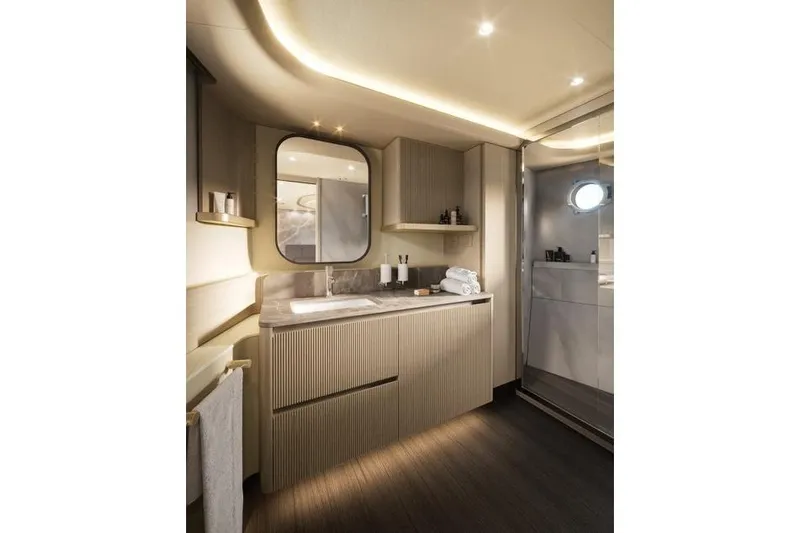  Yacht Photos Pics Luxurious bathroom interior of 2026 Absolute Navetta 66 yacht, featuring modern design and elegant lighting.
