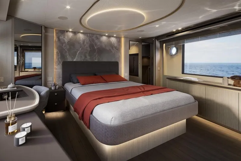 Yacht Photos Pics Luxurious bedroom interior of 2026 Absolute Navetta 66 yacht with ocean view.