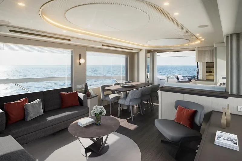  Yacht Photos Pics Luxurious interior of 2026 Absolute Navetta 66 yacht with ocean view and modern furnishings.