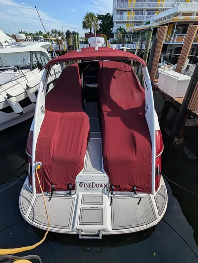 New Engines 2021 Yacht Photos Pics 2005 Cobalt 360 boat with red covers docked at marina.
