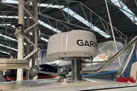 Garmin radar on 2007 Astondoa 53 Open yacht in a covered marina.