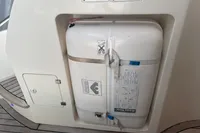 Life raft storage on 2007 Astondoa 53 Open yacht deck.