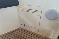 Astondoa 53 Open 2007 yacht interior with wooden flooring and speaker.