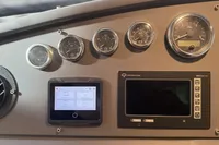 Control panel of a 2007 Astondoa 53 Open yacht with gauges and displays.