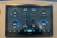 Garmin display showing engine and fuel metrics on a 2007 Astondoa 53 Open yacht.