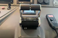 Control panel of a 2007 Astondoa 53 Open yacht with throttle and navigation equipment.