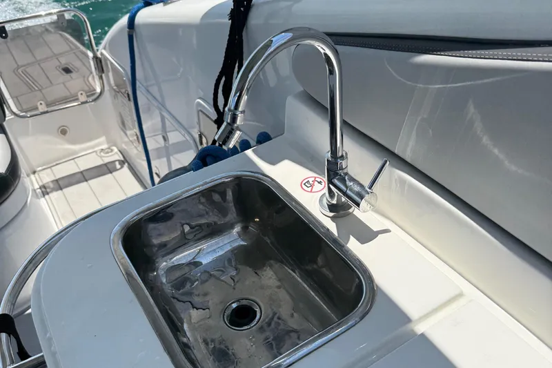  Yacht Photos Pics Stainless steel sink on Schaefer 303 yacht, 2021 model, with chrome faucet.