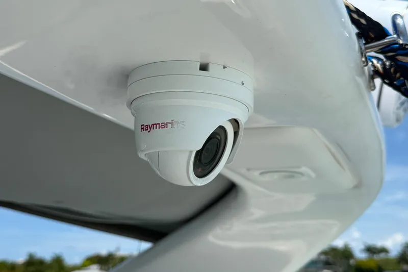  Yacht Photos Pics Raymarine camera on Schaefer 303 boat, 2021 model, mounted under white surface.