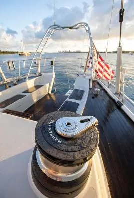 Sorcerer II Yacht Photos Pics Sailing yacht Cookson Frers 1998, deck view with winch and American flag.