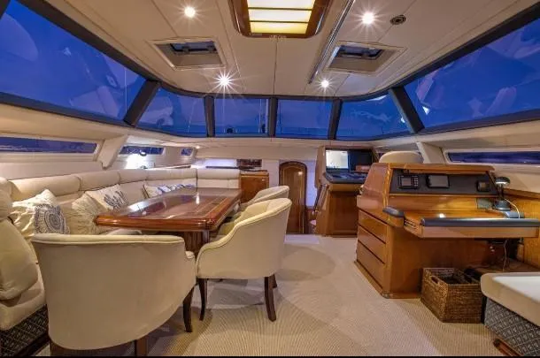 Sorcerer II Yacht Photos Pics Luxurious 1998 Cookson Frers yacht interior with elegant seating and panoramic windows.