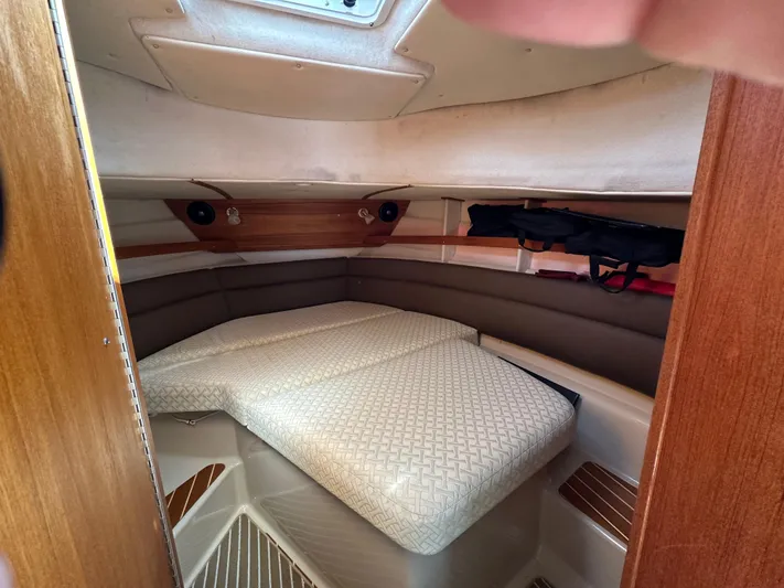  Yacht Photos Pics 2014 Ranger Tugs R-31S cabin interior with bed and storage space.
