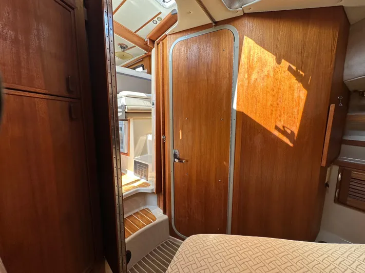  Yacht Photos Pics Interior of 2014 Ranger Tugs R-31S with wooden cabinetry and natural light.