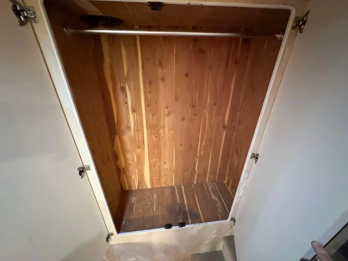 S-dan Yacht Photos Pics 1998 Mainship 47 Owner's Aft Stateroom Locker