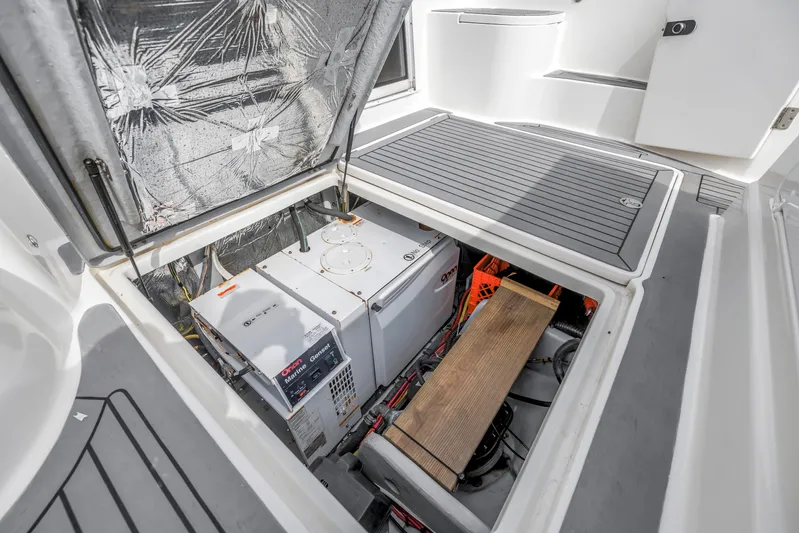  Yacht Photos Pics Open engine compartment of 2007 Meridian 459 Motoryacht, showcasing Onan marine generator.