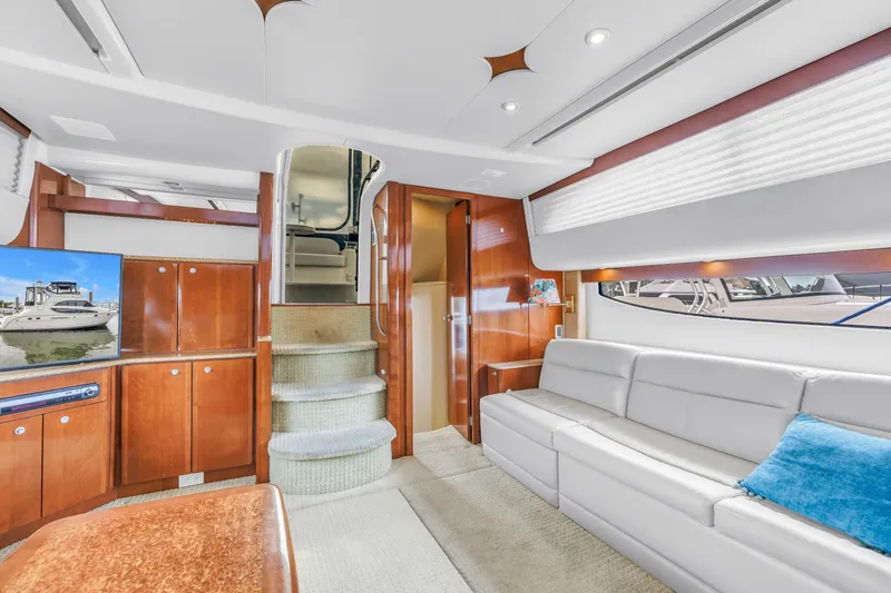  Yacht Photos Pics Luxurious interior of 2007 Meridian 459 Motoryacht with elegant wood finishes and plush seating.