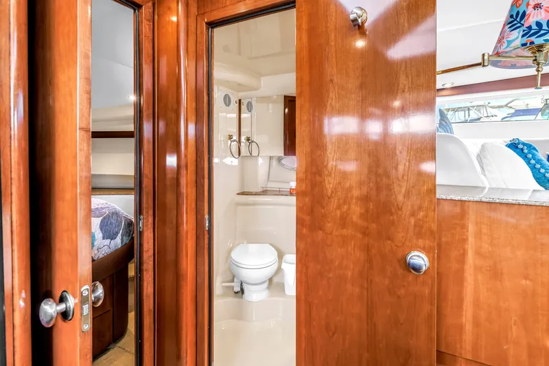  Yacht Photos Pics Luxurious 2007 Meridian 459 Motoryacht interior with wooden finishes and modern amenities.