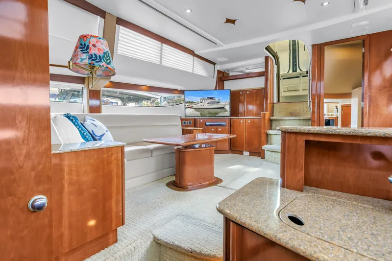  Yacht Photos Pics Luxurious interior of 2007 Meridian 459 Motoryacht with elegant wood finishes and modern amenities.