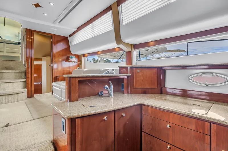 Yacht Photos Pics Luxurious interior of 2007 Meridian 459 Motoryacht with elegant wood finishes and modern amenities.