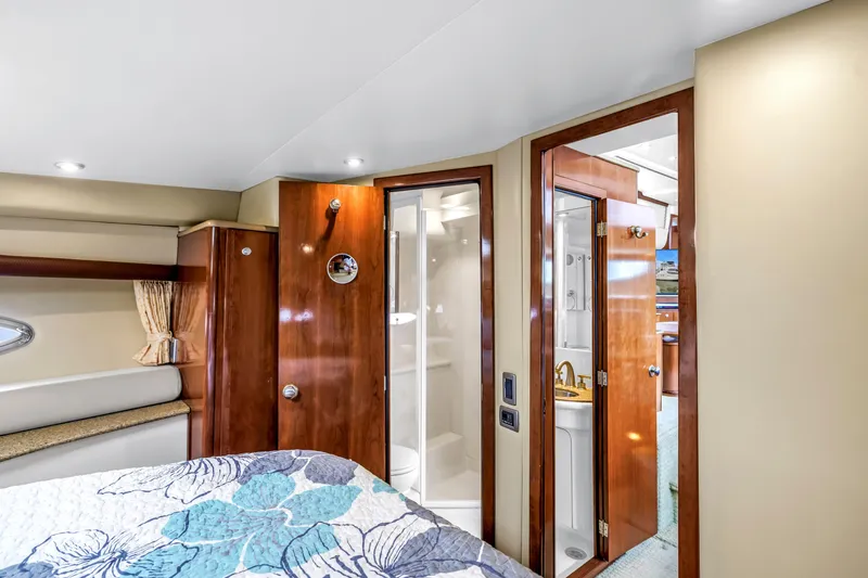  Yacht Photos Pics Interior of 2007 Meridian 459 Motoryacht with elegant wood finishes and cozy bedroom.