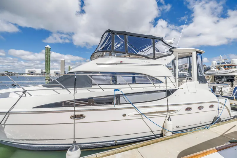  Yacht Photos Pics 2008 Meridian 459 Motoryacht docked under a clear blue sky.