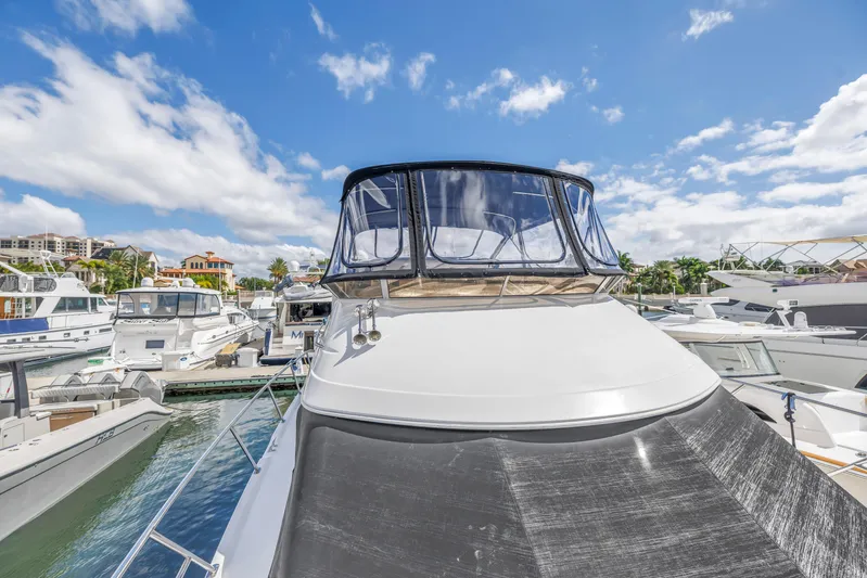  Yacht Photos Pics 2008 Meridian 459 Motoryacht docked at marina under blue sky.
