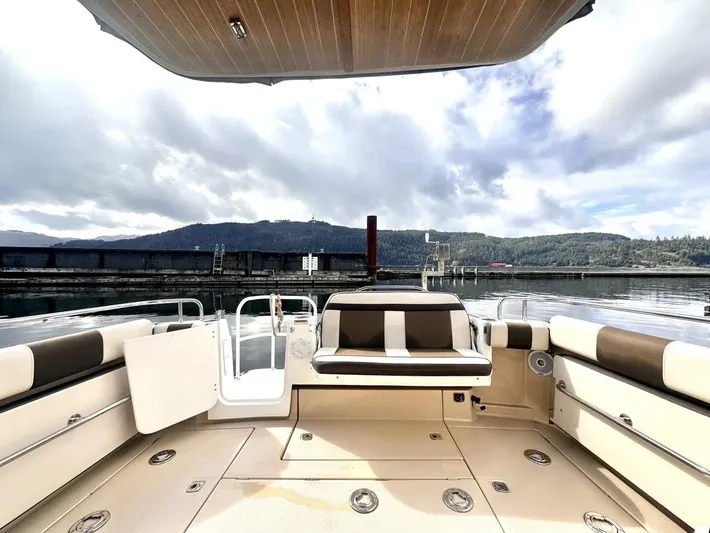  Yacht Photos Pics 2015 Ranger Tugs R-29S boat interior with scenic waterfront view.