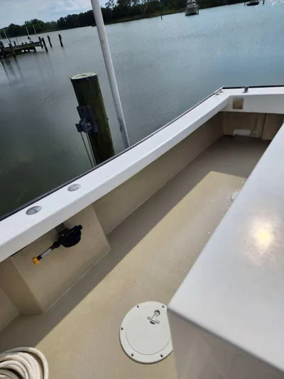  Yacht Photos Pics 2016 Custom Broad Creek 32 Downeast boat deck by calm waters.