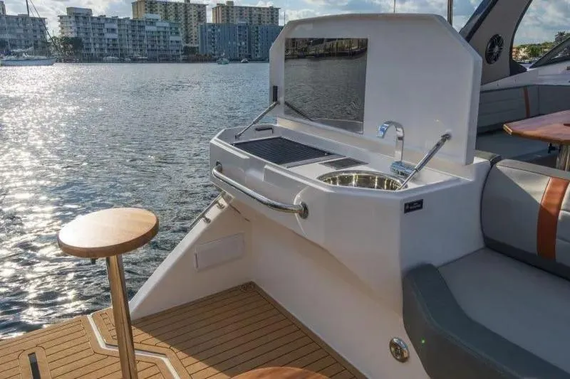  Yacht Photos Pics Luxury outdoor kitchen on Hanover 377 yacht, 2025 model, with waterfront view.