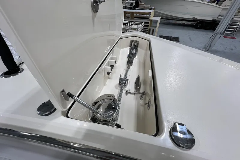  Yacht Photos Pics 2025 Scout 530 LXF boat anchor compartment with polished metal fittings.