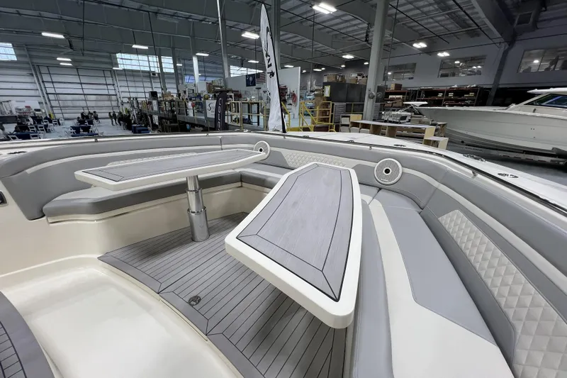  Yacht Photos Pics 2025 Scout 530 LXF boat interior with sleek seating and modern design.