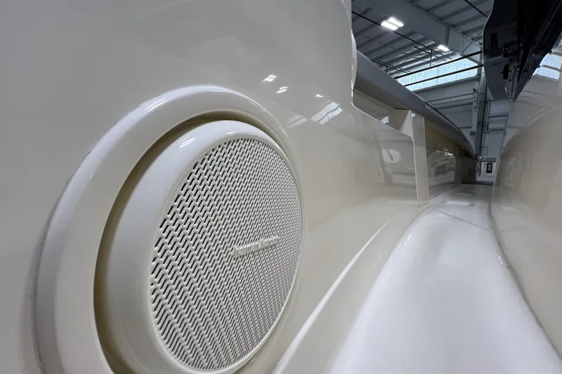  Yacht Photos Pics 2025 Scout 530 LXF boat interior with speaker detail in a showroom.