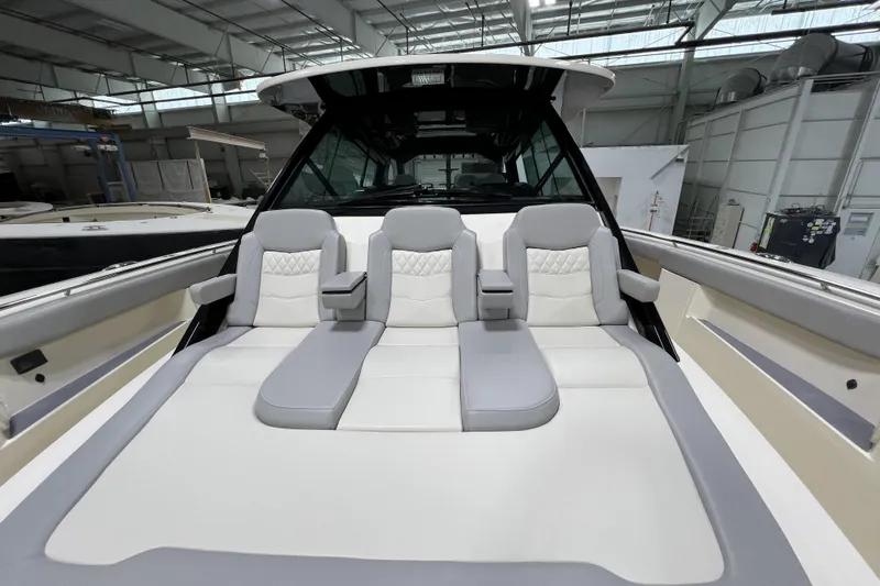  Yacht Photos Pics 2025 Scout 530 LXF boat interior with luxurious seating in a modern design.