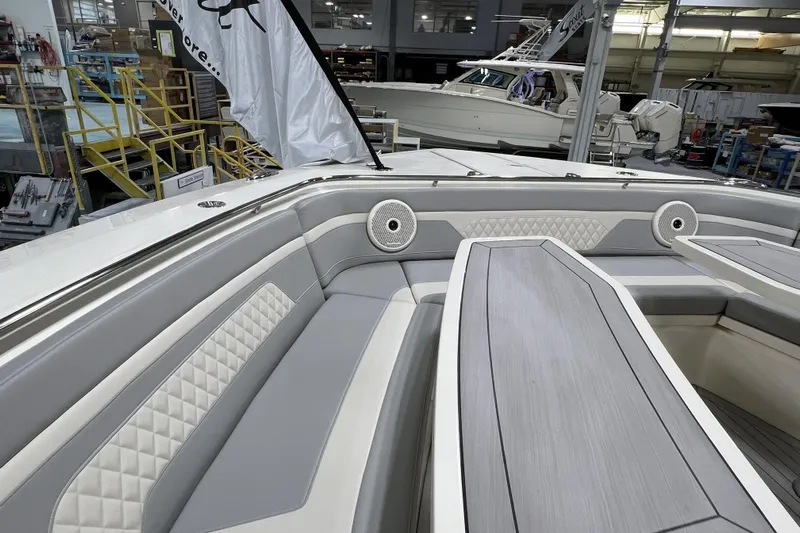  Yacht Photos Pics 2025 Scout 530 LXF boat interior with luxurious seating and modern design.