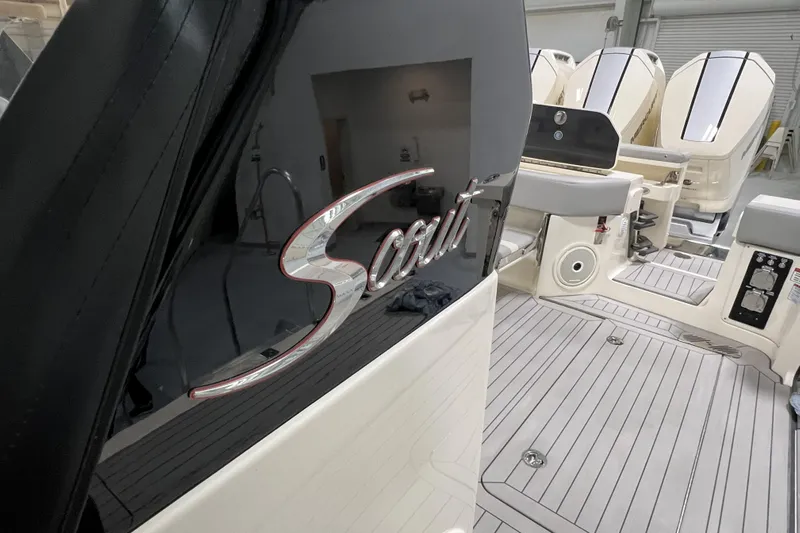  Yacht Photos Pics 2025 Scout 530 LXF boat interior with logo and sleek design details.