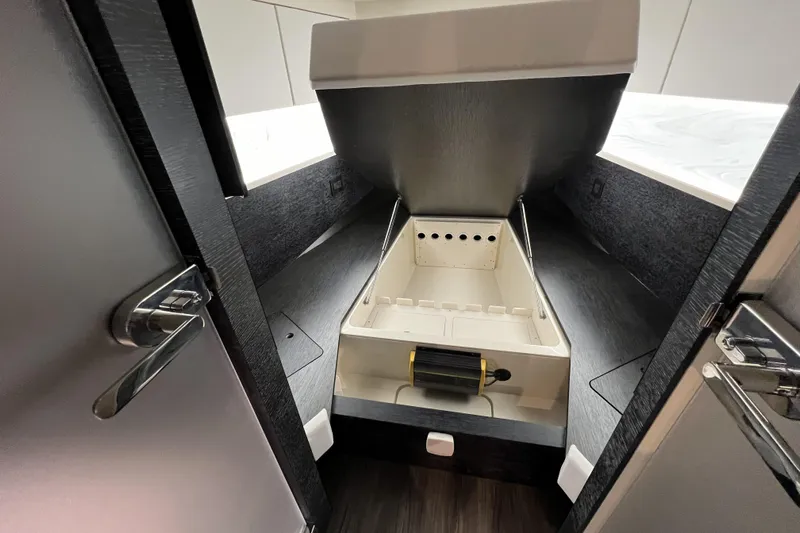  Yacht Photos Pics 2025 Scout 530 LXF interior with modern design and storage compartment.